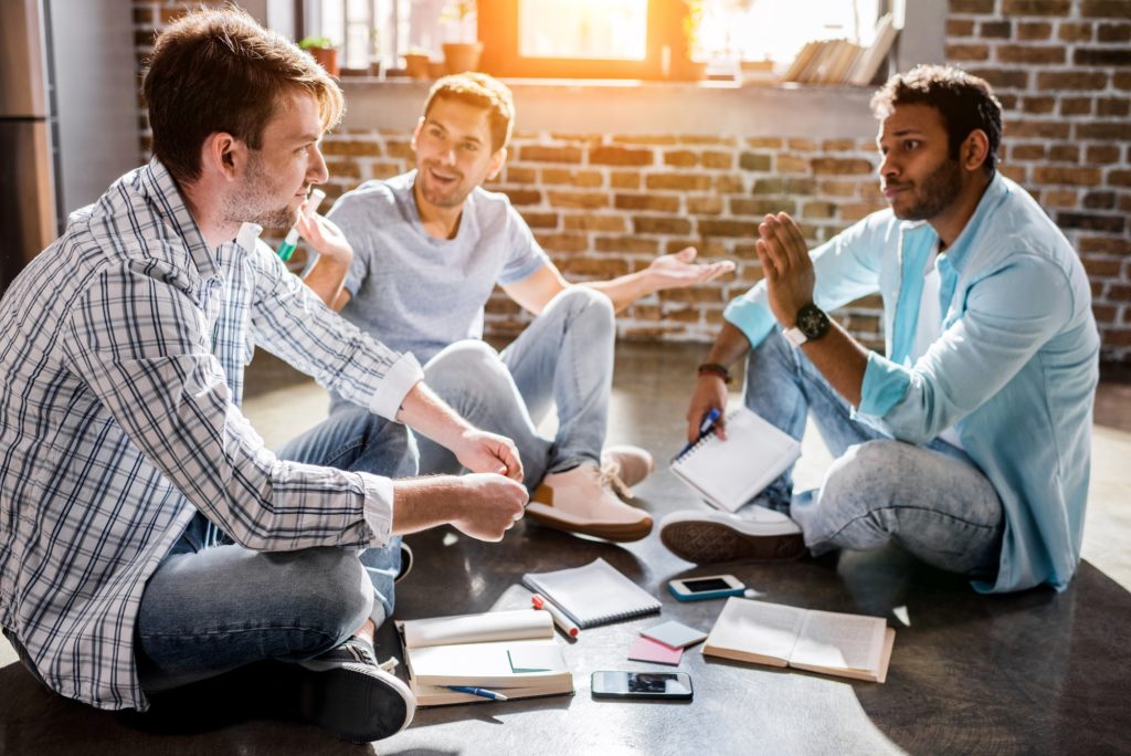 young professional group working on new business project in small business office, small business